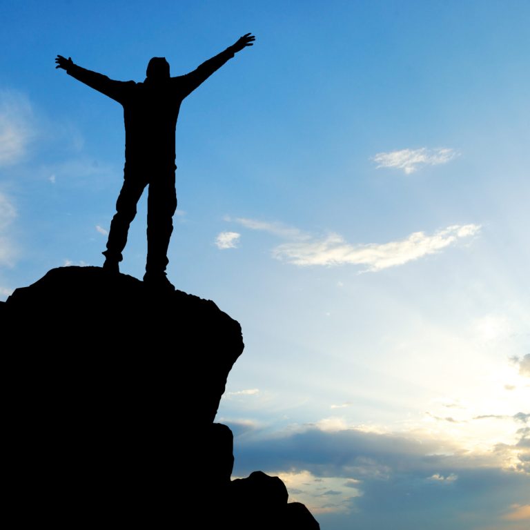 Man on top of mountain. Conceptual design.